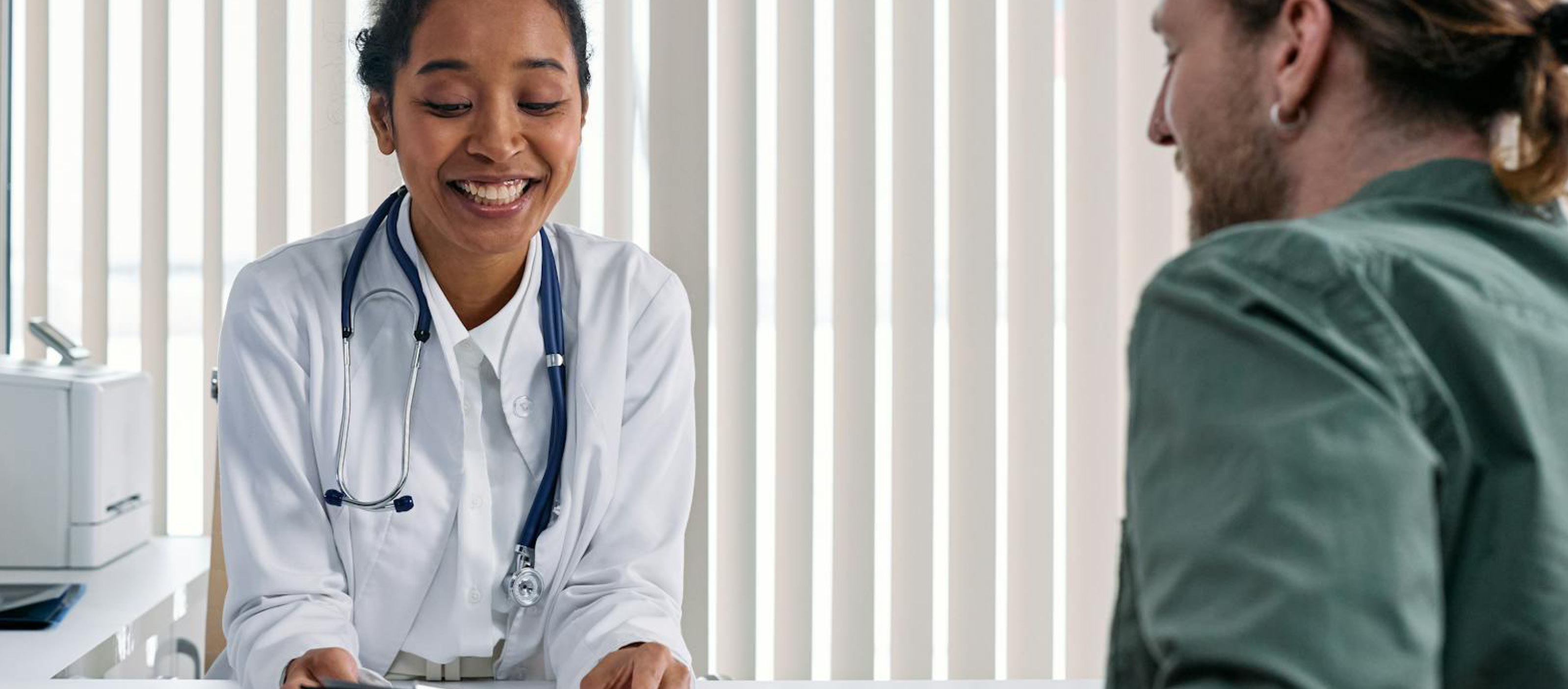 Doctor talking with patient