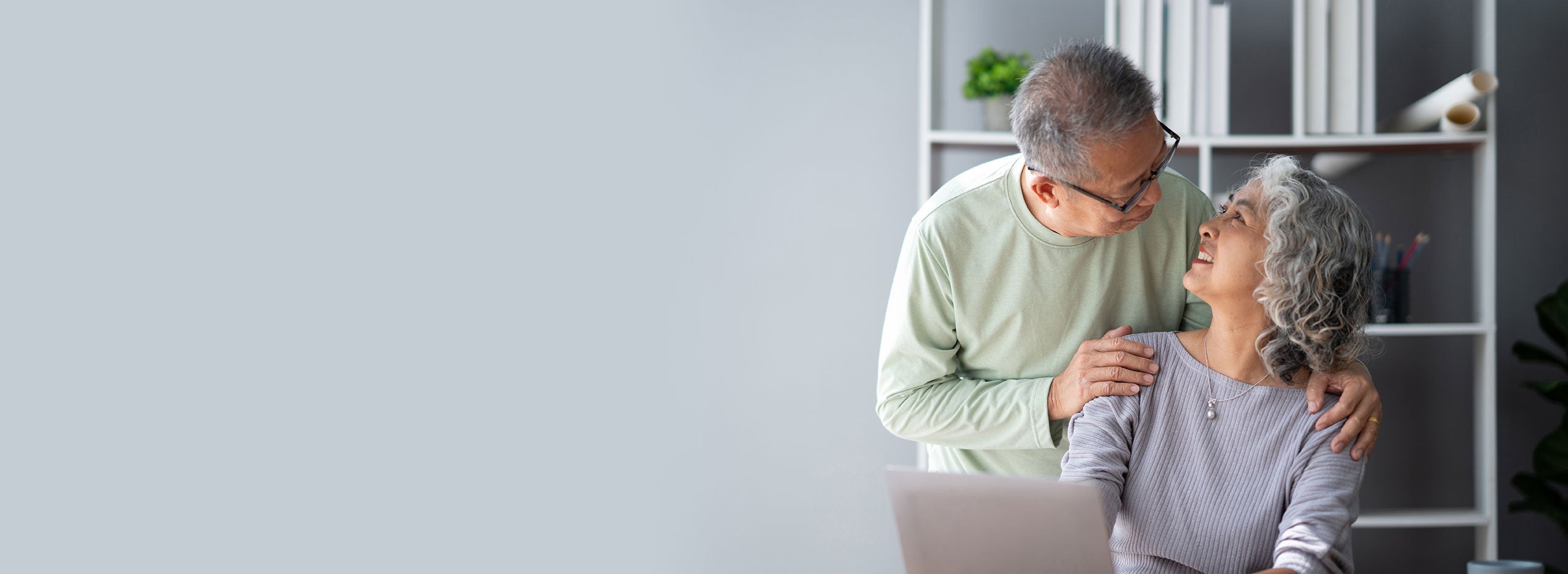 Two people on computer